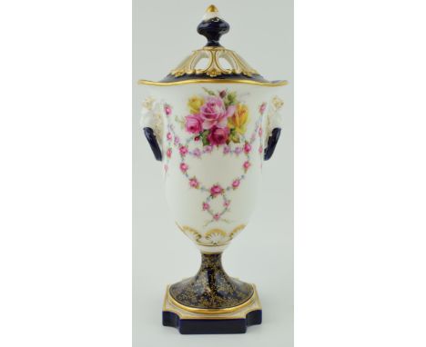 Royal Worcester potpourri and cover, with lion heads with rings, floral sprays, gilt and cobalt blue decoration, pierced lid,