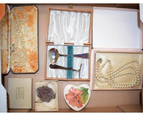 A mixed collection of items to include pearl necklaces, a Moorcroft heart shaped trinket box together with a coin pendant on 