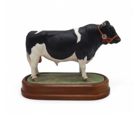 DORIS LINDNER FOR ROYAL WORCESTER - FRIESIAN BULL limited edition no. 314/500, printed marks, on oval wooden base, 26cm long,