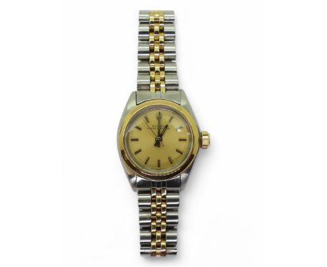 A LADIES OYSTER PERPETUAL in stainless steel and gold. A gold coloured dial, baton numerals and hands. diameter of the case 2