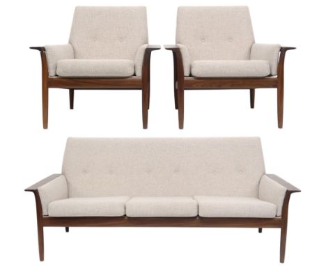 A MID 20TH CENTURY IRISH AFROMOSIA "CRANNAC" BY JOHN HOGG & CO LTD THREE PIECE SUITE  consisting of a three seater settee in 
