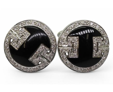 ONYX &amp; DIAMOND CUFFLINKS made in 18ct white gold with a key pattern picked out in pave set diamonds, diameter 1.8cm, weig