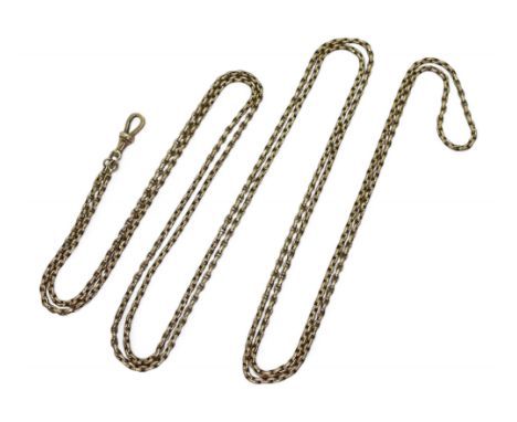 A VINTAGE GUARD CHAIN the yellow metal belcher chain is cut with light catching facets, it has a soldered on tag stamped '9c'