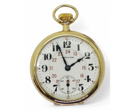 A HAMILTON OPEN FACE with a 14k gold case, the white enamel dial has black Arabic numerals, and red 24hr numerals, a subsidia