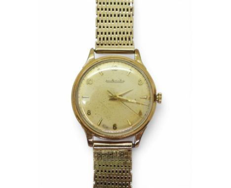 A JAEGER LE COULTRE gold colour dial with arrow and Arabic numerals and dauphin hands, diameter of the case 3.3cm. Inner case