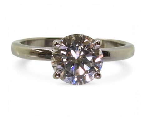 A SUBSTANTIAL DIAMOND SOLITAIRE the 9ct white gold ring mount is set with a 1.75ct brilliant cut diamond in a four claw setti