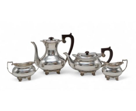 A GEORGE VI FOUR PIECE SILVER TEA SERVICE by Charles S Green &amp; Co Ltd, the teapot, sugar bowl and cream jug Birmingham 19