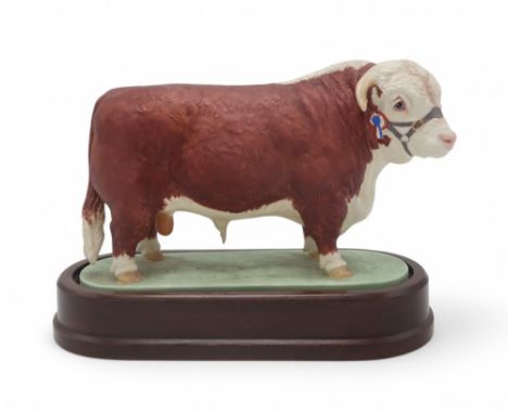 DORIS LINDNER FOR ROYAL WORCESTER - HEREFORD BULL printed marks, on oval wooden base, 26cm long Condition Report:in good cond