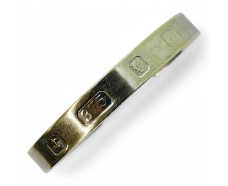 A GENTS BANGLE with oversized hallmarks for London 2003. Inner diameter approx 7cm but could be bigger. Width 1cm. Weight 32.