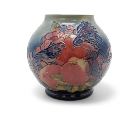 A MOORCROFT FINCH AND BERRIES PATTERN VASE of bulbous form, 17cm high Condition Report:light crazing