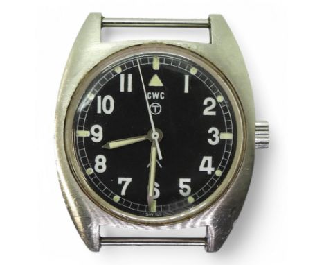 A CWC MILITARY WATCH a 1970's example with black dial Arabic numerals and luminous indices and hands. numbers to the back of 
