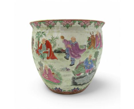 A CHINESE FAMILLE ROSE PLANTER Painted and printed with immortal figures,animals,trees and folaige,36cm high Condition Report