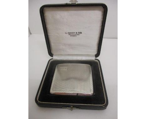 A mid 20th century Chinese silver cigarette case of curved form with engine turned decoration, stamped Silver 0.950 