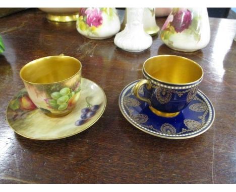 Two Royal Worcester cabinet cups and saucers, one teacup signed, 'M Hart', the saucers signed 'T Lockyer' 