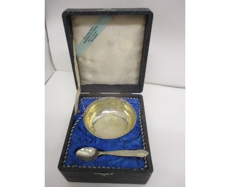 A Chinese silver child's bowl, 4" dia and matched spoon by Zee Sung & Co, the bowl with spot hammered and character mark deco
