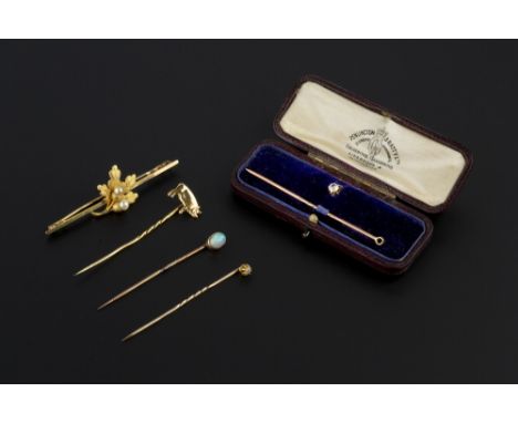 A DIAMOND DRESS STUD AND STICK PIN SET, the old-cut diamond in claw setting, with detachable threaded stud and stick pin fitt