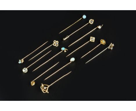 A COLLECTION OF GEM SET STICK PINS, to include a diamond set heart-shaped knot stick pin, a diamond single stone stick pin, a