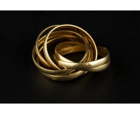 AN 18CT GOLD RUSSIAN WEDDING BAND, designed as six entwined bands, hallmarked for London 1990, maker's mark B &amp; N, ring s