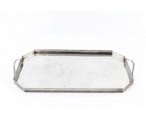 A SILVER RECTANGULAR TWIN HANDLED TRAY, with canted corners, pierced gallery and reeded handles, by Harrison Brothers &amp; H