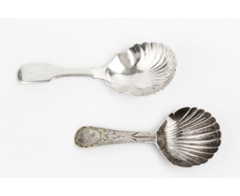 A WILLIAM IV PROVINCIAL SILVER CADDY SPOON with scalloped bowl and fiddle pattern handle, by William Woodman, (Bristol) Exete