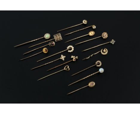 A COLLECTION OF ANTIQUE AND LATER STICK PINS, comprising a diamond single stone stick pin, the old-cut diamond in claw settin