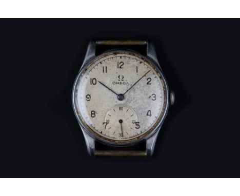 A GENTLEMAN'S WATCH HEAD BY OMEGA, the circular dial with black Arabic numerals, outer minute scale and subsidiary seconds di