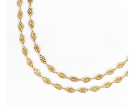 A FRENCH FANCY-LINK LONG CHAIN, designed as a series of repeating wirework panels, the fitting with eagle's head control mark