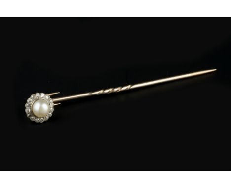 A HALF PEARL AND DIAMOND CLUSTER STICK PIN, the detachable cluster panel centred with a half pearl, bordered by millegrain se