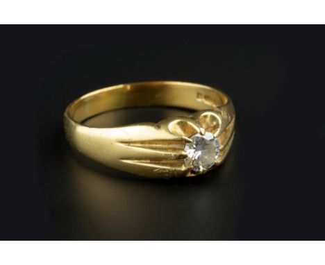 A DIAMOND SINGLE STONE RING, the round brilliant-cut diamond in gypsy setting, 18ct gold mounted, total diamond weight approx