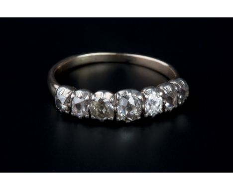 A DIAMOND HALF HOOP RING, comprising 19th century components, the graduated cushion-shaped old-cut and table-cut diamonds in 