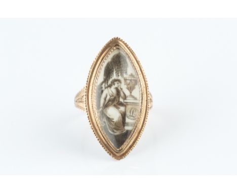 A GEORGIAN MEMORIAL PANEL RING, the navette-shaped ivory panel painted en grisaille to depict a maiden in mourning, beside a 