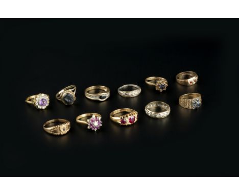 A COLLECTION OF GEM AND STONE SET DRESS RINGS, to include a ruby and diamond snowflake cluster ring, 18ct gold mounted, a red