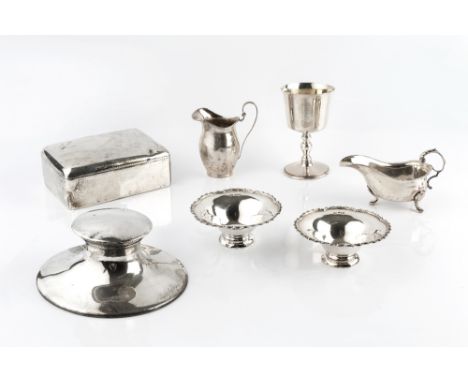 A GROUP OF SILVER, comprising a large capstan inkwell by A &amp; J Zimmerman Ltd, Birmingham 1920; a pair of pedestal sweetme