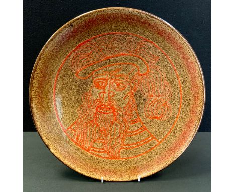 A Poole Aegean charger, in red, with stylised portrait of a Gentleman ,  36cm diam, printed mark 