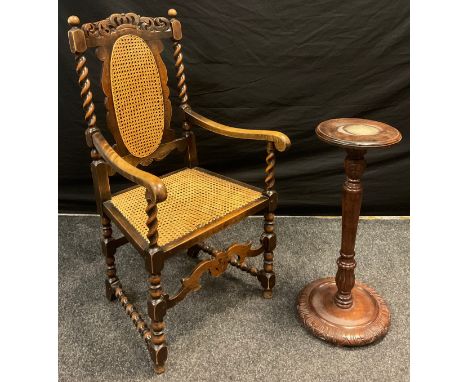 A Victorian Jacobean revival armchair, carved cresting, scroll arms, barley twist supports, Bergere weave back and seat, 112c