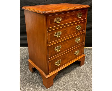 A small George III style burr walnut and walnut reproduction chest of drawers, with four graduated drawers, bracket feet, 75.
