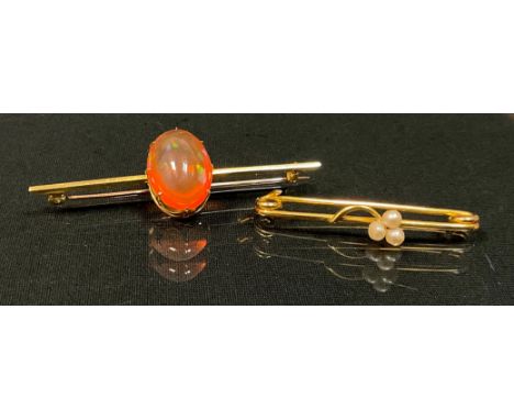 A late Victorian/Edwardian seed pearl bar brooch, 9ct gold mount, Chester 1901, 2.6g gross;  another oval cabochon possibly a