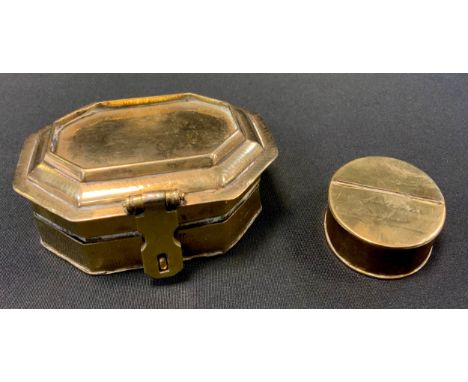 A 19th century brass canted rectangular spice box, with double hinged covers, 9.5cm wide, c.1860;  a 19th century oval snuff 