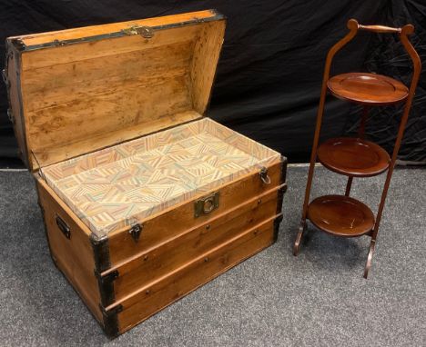 A Drawco patent Edwardian domed rectangular cabin trunk, steel bound, pitch pine, c.1905, carrying handles to sides; an Edwar