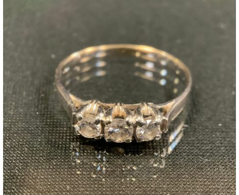 A diamond ring, liner set with three round brilliant cut diamonds, total estimated diamond weight approx 0.50ct, indistinctly