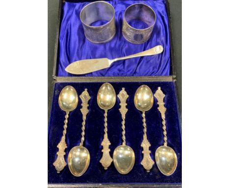 A set of six Victorian silver aesthetic movement teaspoons, cased; a silver napkin ring; etc (qty) 