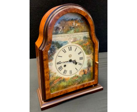 A German mantel clock, arched case, the dial decorated with Hounds, Ducks, Fox, Pheasants etc, mechanical movement, 37cm high