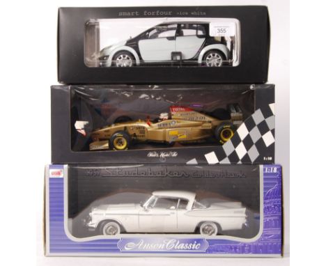 A collection of 3x 1:18 scale boxed diecast models. The first being an Anson Classics 1957 Studebaker Golden Hawk, a Paul's M