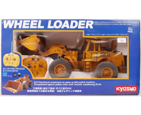 A good Kyosho made large 1:14 scale Radio Controlled ' Wheel Loader '. Likely unused, complete, within the original display b