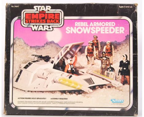 An original vintage Kenner made Star Wars ' Rebel Armored Snow Speeder '. With both side guns present. Within an original ' E