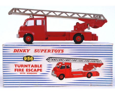 An original vintage Dinky diecast model 956 Turntable Fire Escape. Within the original box, with card inserts present. 