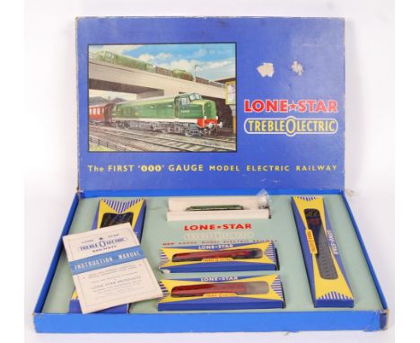 A rare vintage Lone Star 000 Treble-o-lectric gauge railway trainset EL51 ' Passenger Set.' Appears complete, within the orig