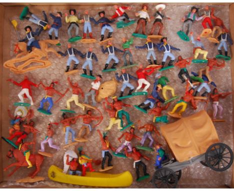 A good collection of assorted loose vintage Timpo Cowboys &amp; Indians figures. Along with a wagon and canoe figure set. Som