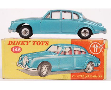 An original vintage Dinky Toys diecast model 146 2 1/2 Litre V8 Daimler with Prestomatic Steering. Appears very near mint to 