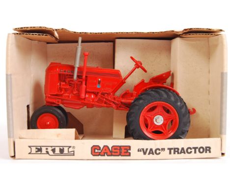 A vintage ERTL 1:16 scale diecast model CASE ' Vac ' Tractor 632. Appears mint and unused, within the original cardboard box.